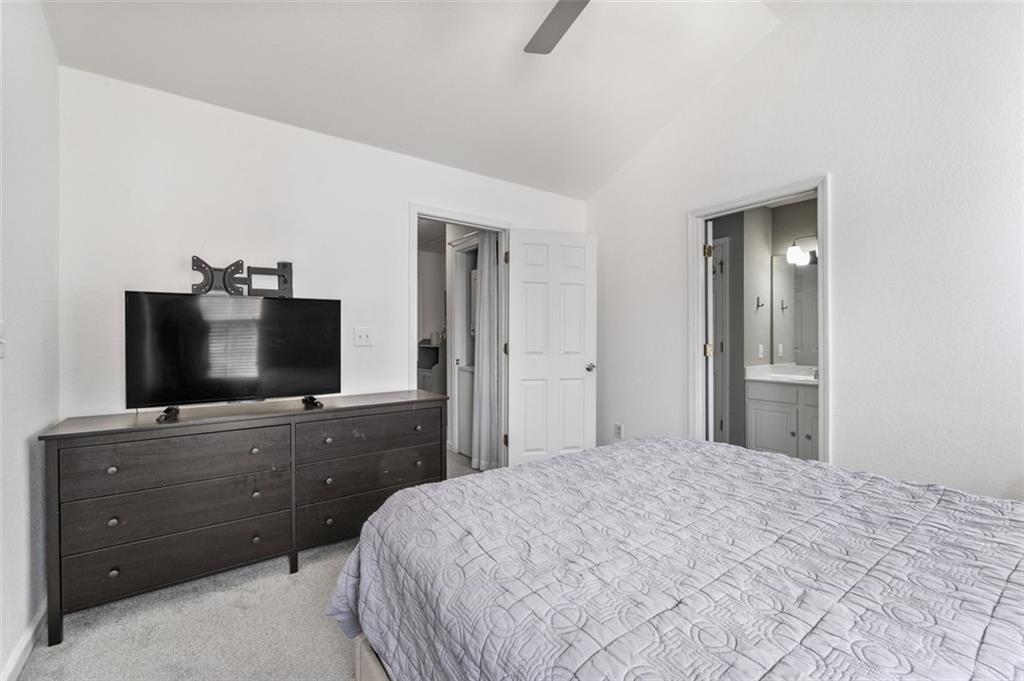 2744 Snapfinger Manor Decatur, GA 30035 - Photo 25 of 29 a bedroom with a bed and a flat screen tv