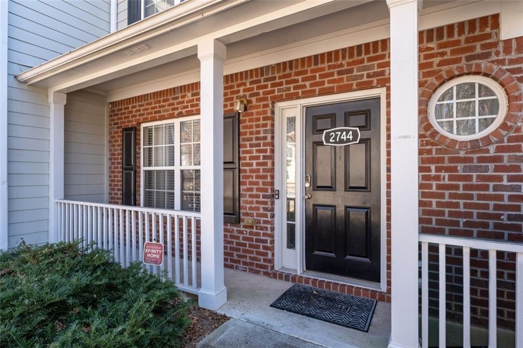 2744 Snapfinger Manor Decatur, GA 30035 - Photo 5 of 29 a front view of a house with a door