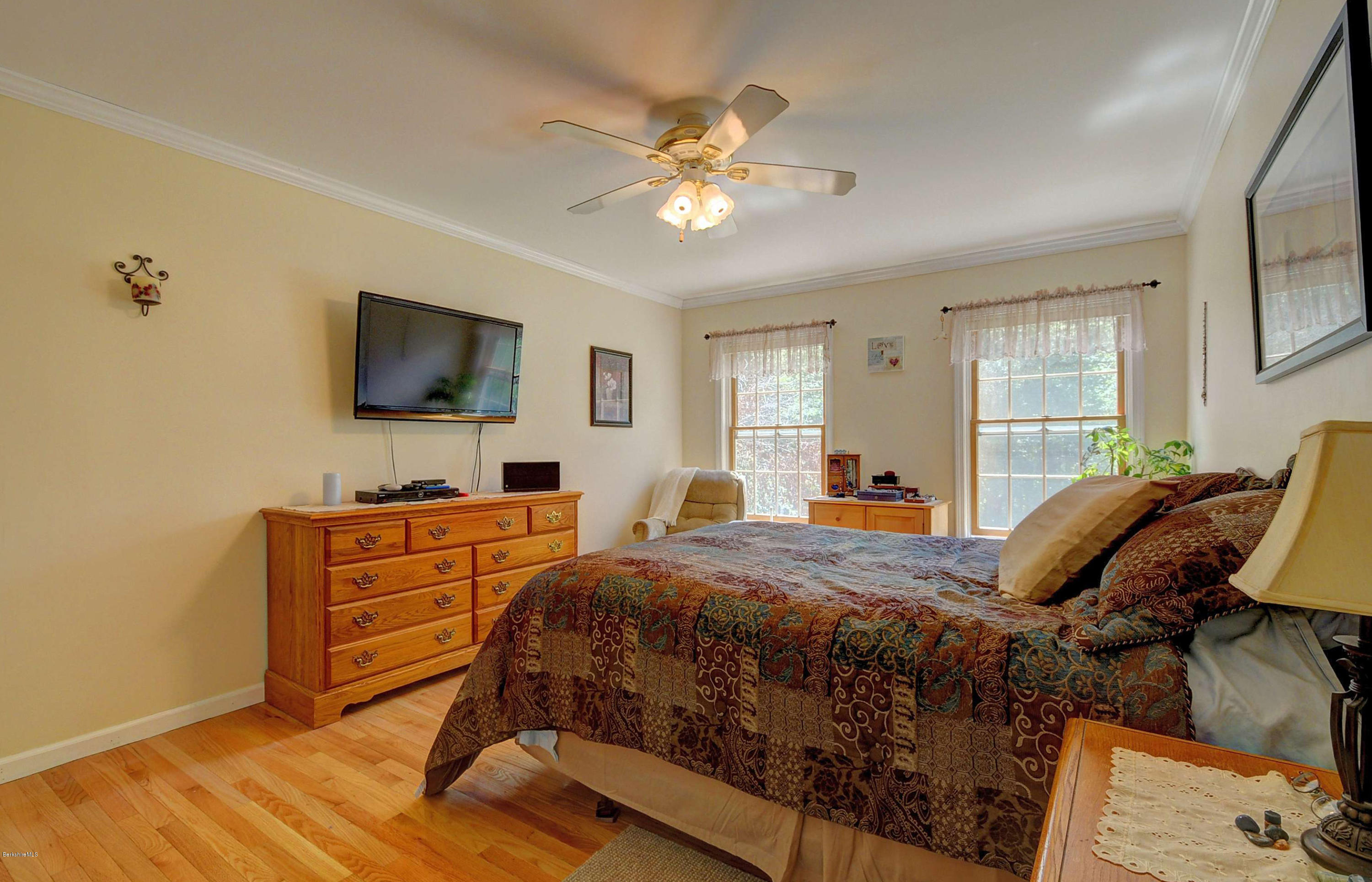 265 Smith Road Hinsdale, MA 01235 - Photo 23 of 27 a bedroom with a bed and a flat screen tv