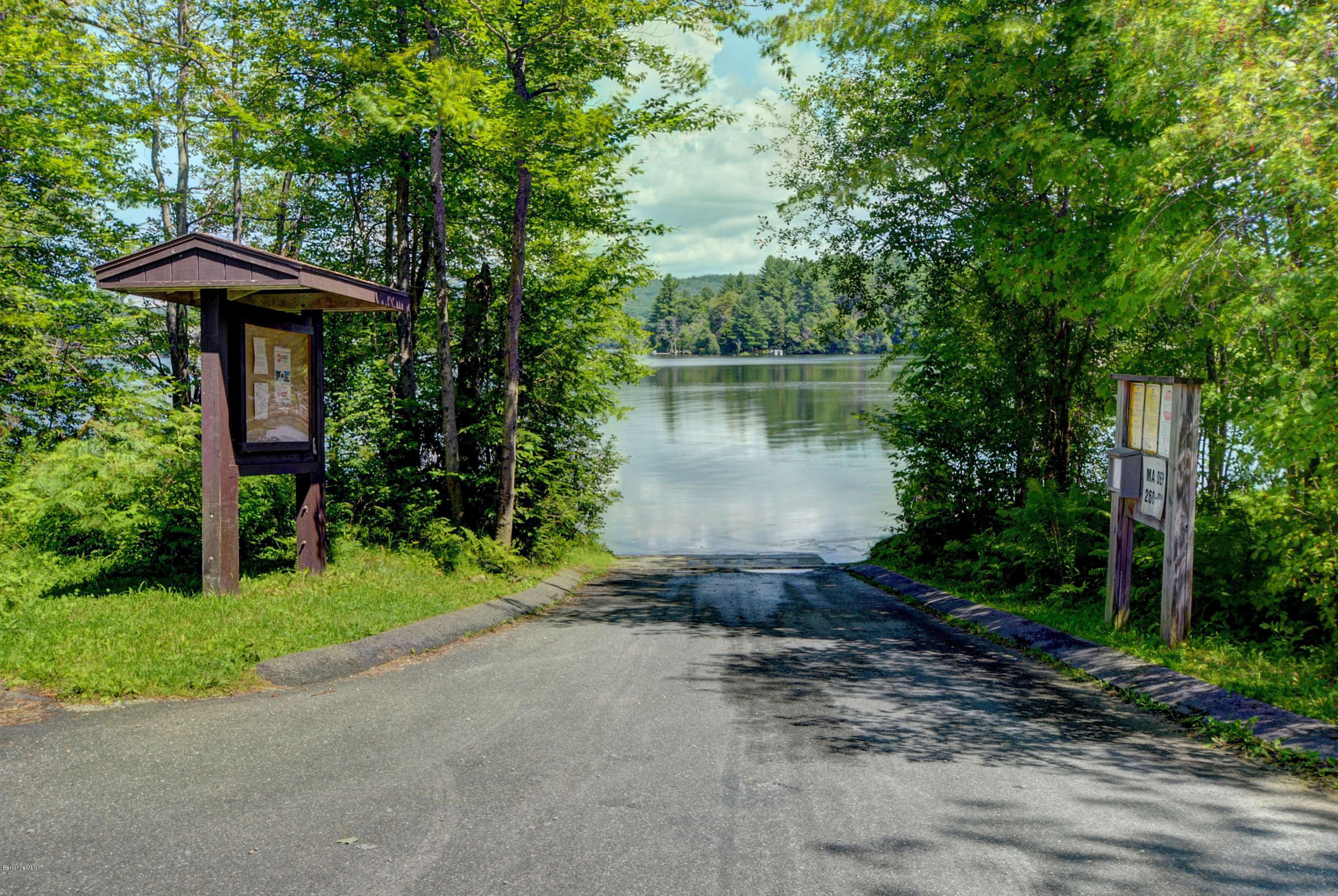 265 Smith Road Hinsdale, MA 01235 - Photo 9 of 27 a front view of a house with garden