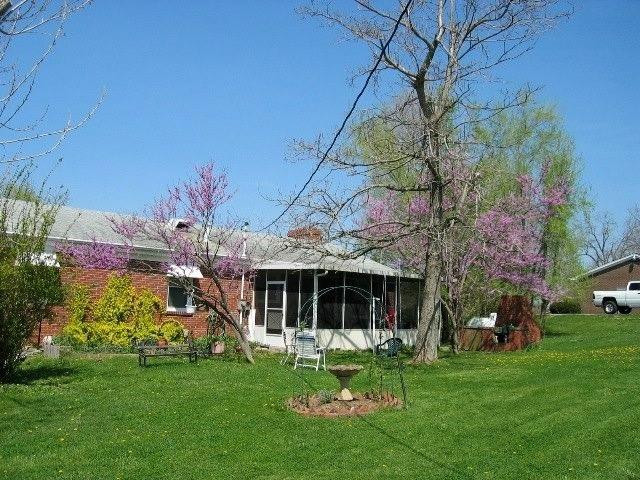 253 Anderson Road Georgetown, KY 40324 - Photo 8 of 31 Spring view of rear of house with red bu