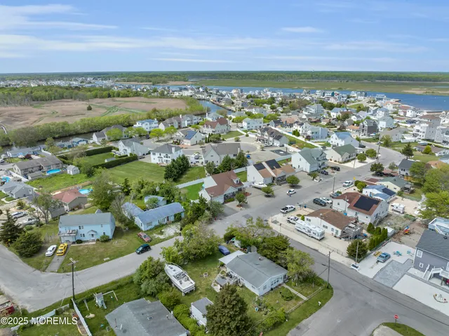 an aerial view of a city with lots of residential buildings