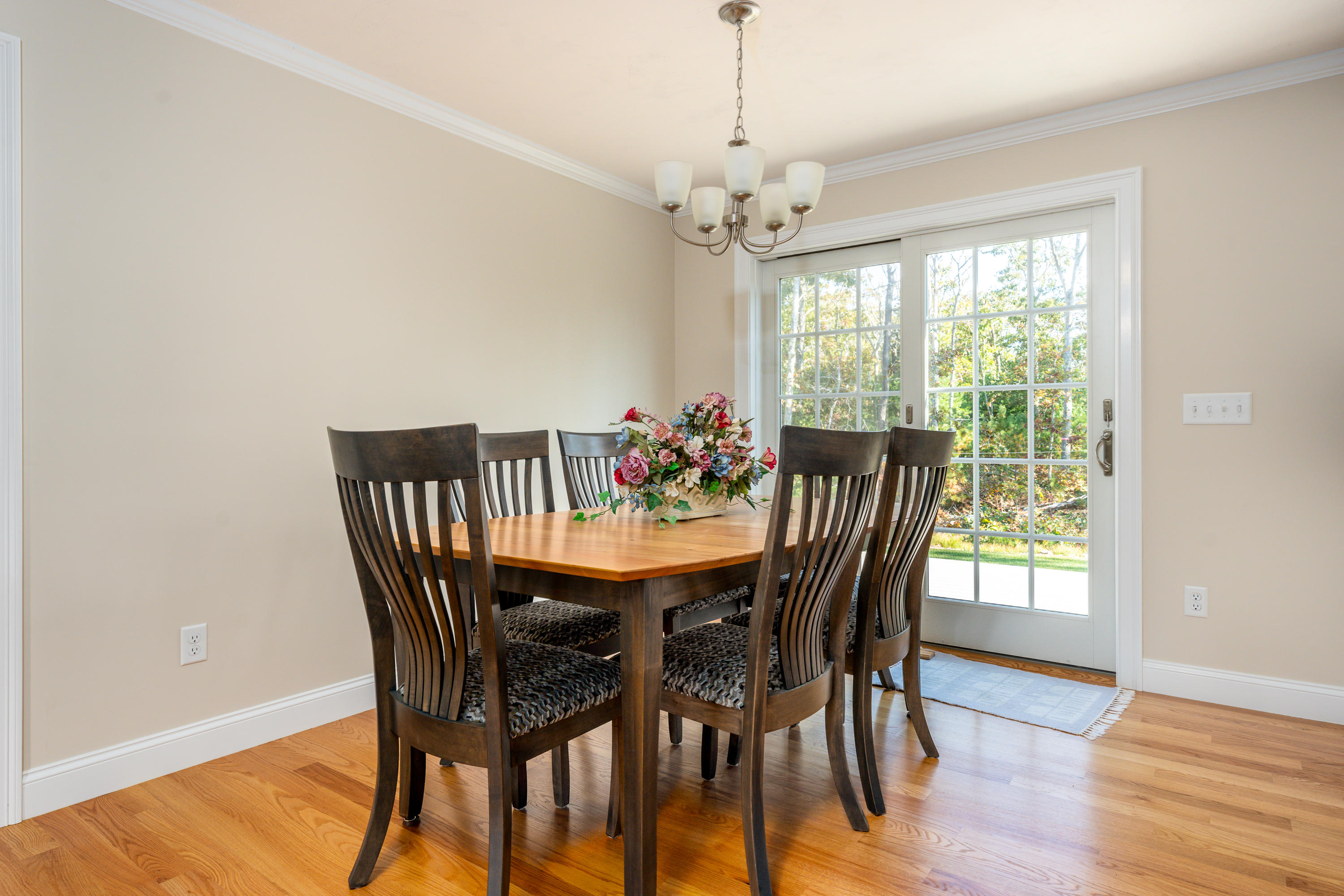 297 Depot Road Harwich, MA 02645 - Photo 8 of 22 a view of a dining room with furniture window and wooden floor