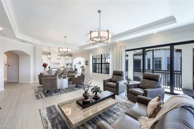 a living room with furniture and a table