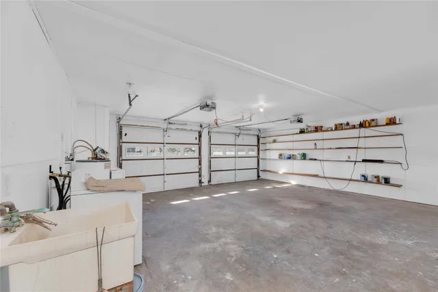 a view of a room with cabinet and air hockey table