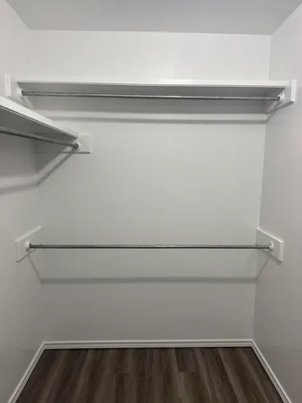 a view of small space with racks on the wall