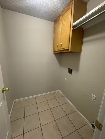 a view of a utility room with a sink