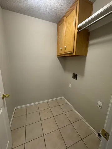 a view of a utility room with a sink