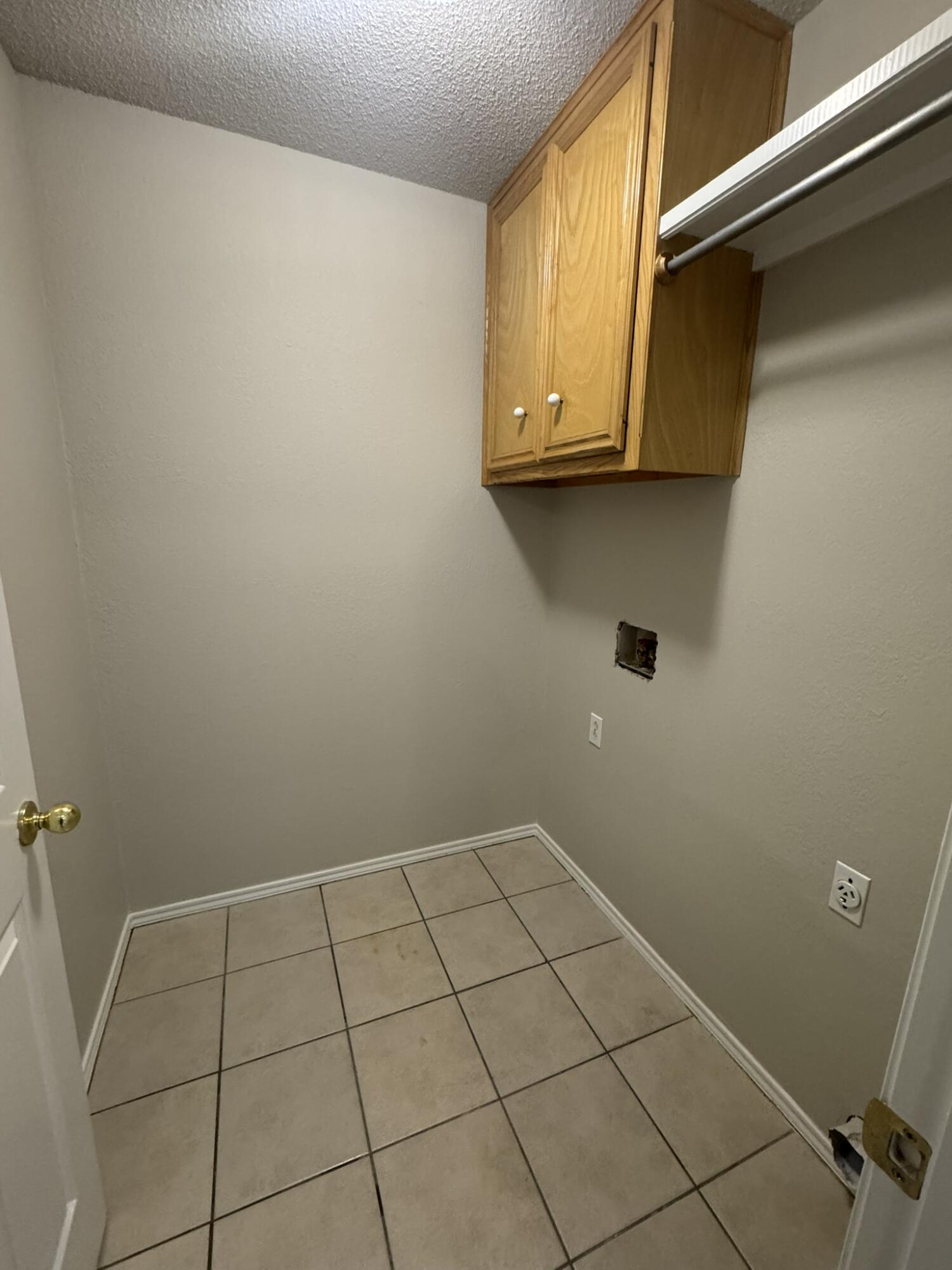 209 Grover Avenue Lubbock, TX 79416 - Photo 19 of 19 a view of a utility room with a sink