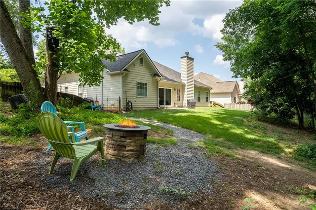 a view of backyard with green space