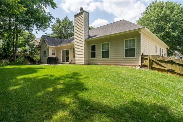 a view of a backyard with a garden