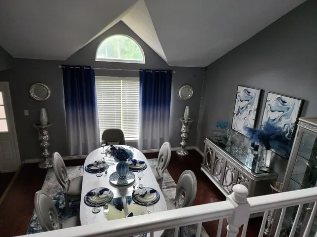 a table and chairs in a room