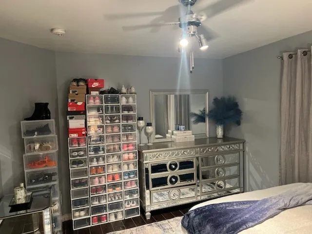 a room with a bed and furniture