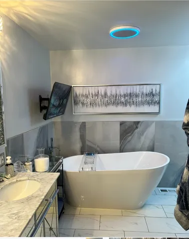 a view of a bathtub in a bathroom