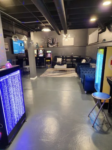 a dining table with chairs and window