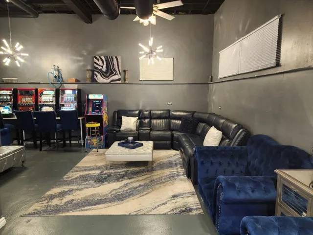 a bedroom with bed and window