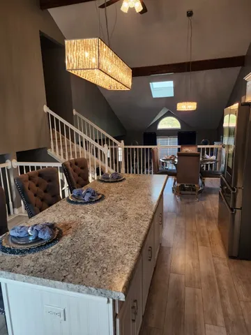 a view of a living room and dining room