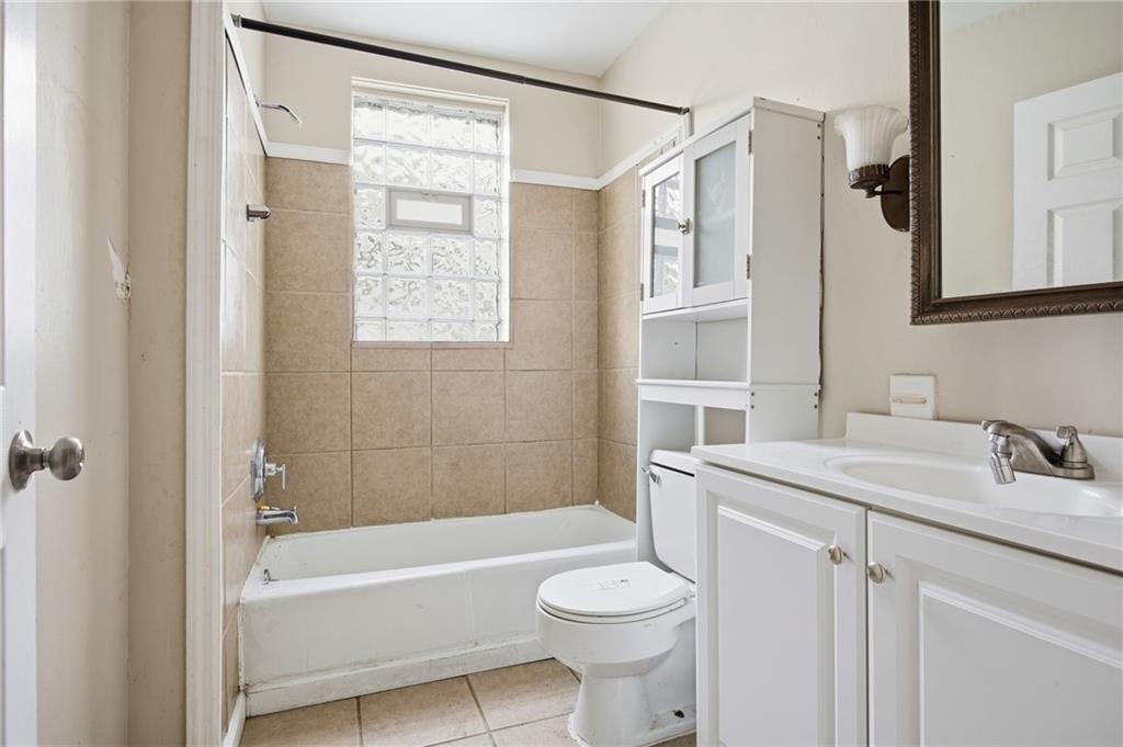 764 Mary Street McKees Rocks, PA 15136 - Photo 13 of 25 a bathroom with a sink a toilet and shower