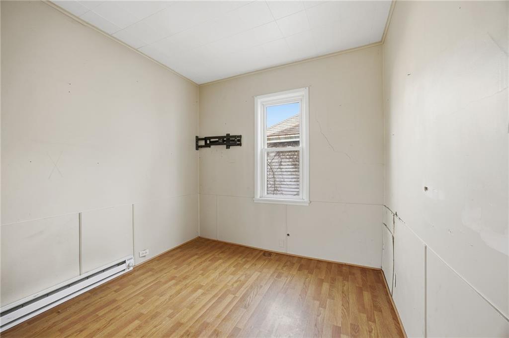 764 Mary Street McKees Rocks, PA 15136 - Photo 16 of 25 an empty room with windows