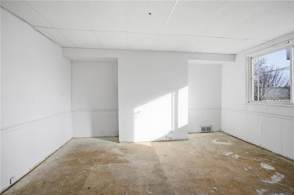 764 Mary Street McKees Rocks, PA 15136 - Photo 19 of 25 an empty room with windows