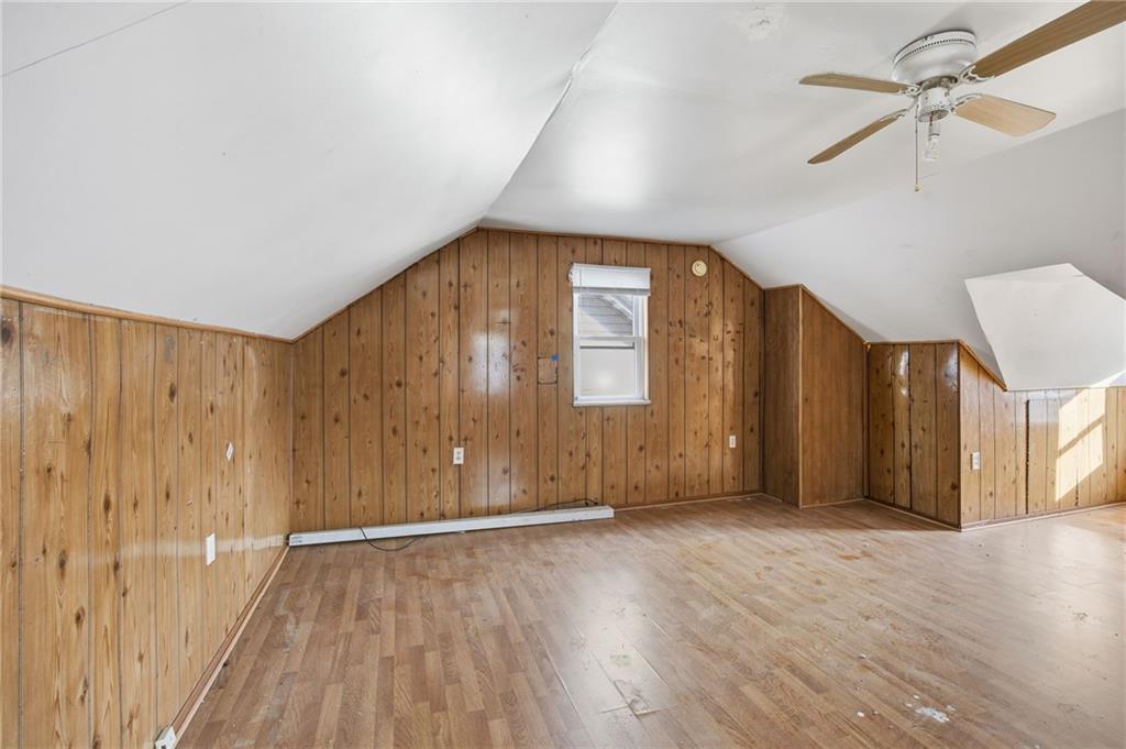 764 Mary Street McKees Rocks, PA 15136 - Photo 21 of 25 wooden floor in an empty room with a window