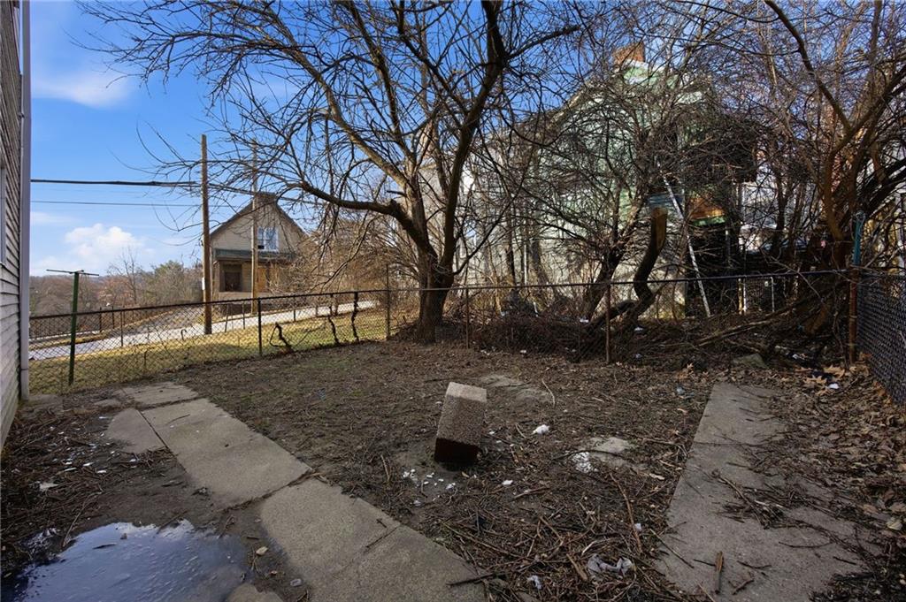 764 Mary Street McKees Rocks, PA 15136 - Photo 25 of 25 a view of a yard with plants and trees