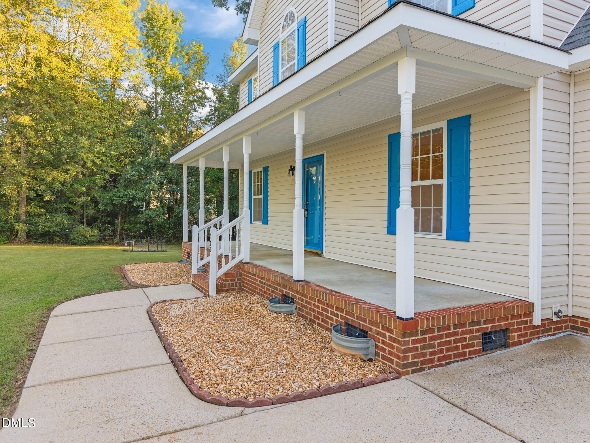 505 Vinson Road Clayton, NC 27527 - Photo 5 of 31 a front view of a house with porch