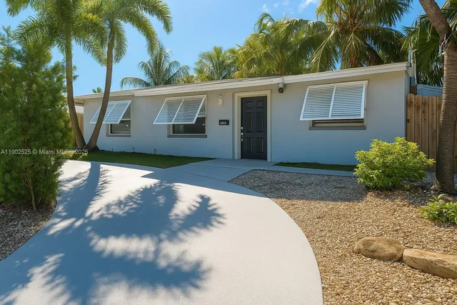 a view of backyard of a house