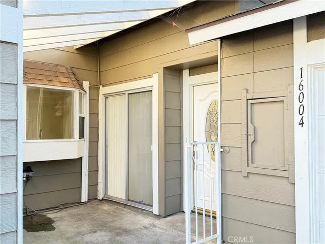 a view of front door and bedroom