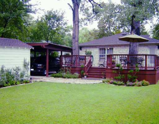 1509 Alguno Road Austin, TX 78757 - Photo 1 of 1 a view of a house with a yard porch and sitting area
