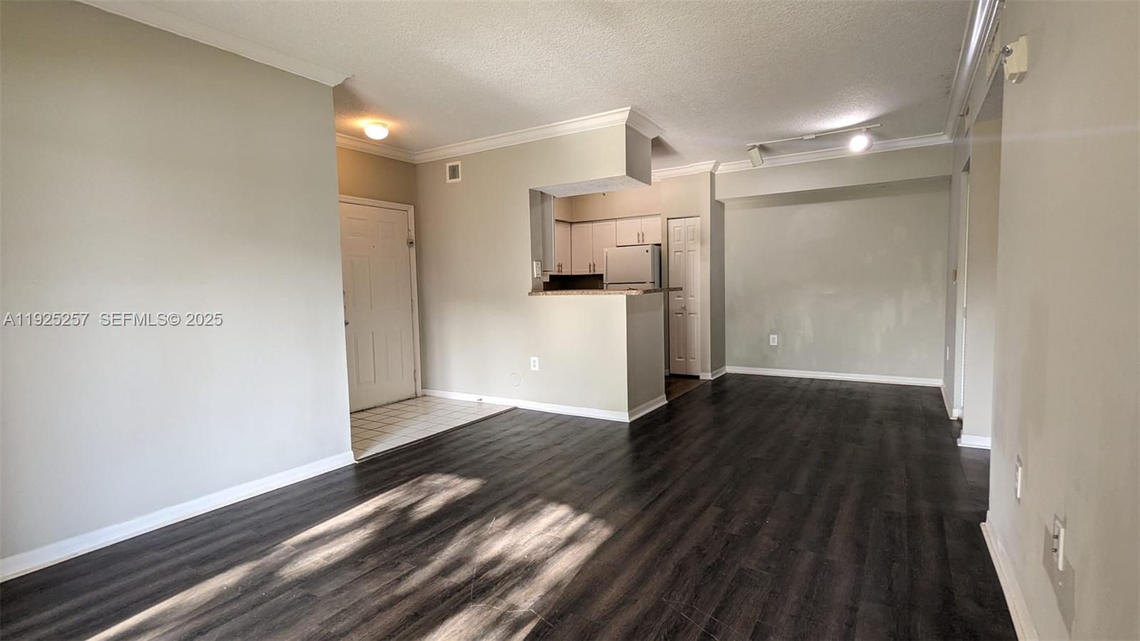 160 Southwest 117th Terrace, Unit 6106 Pembroke Pines, FL 33025 - Photo 13 of 28 a view of a hallway with wooden floor