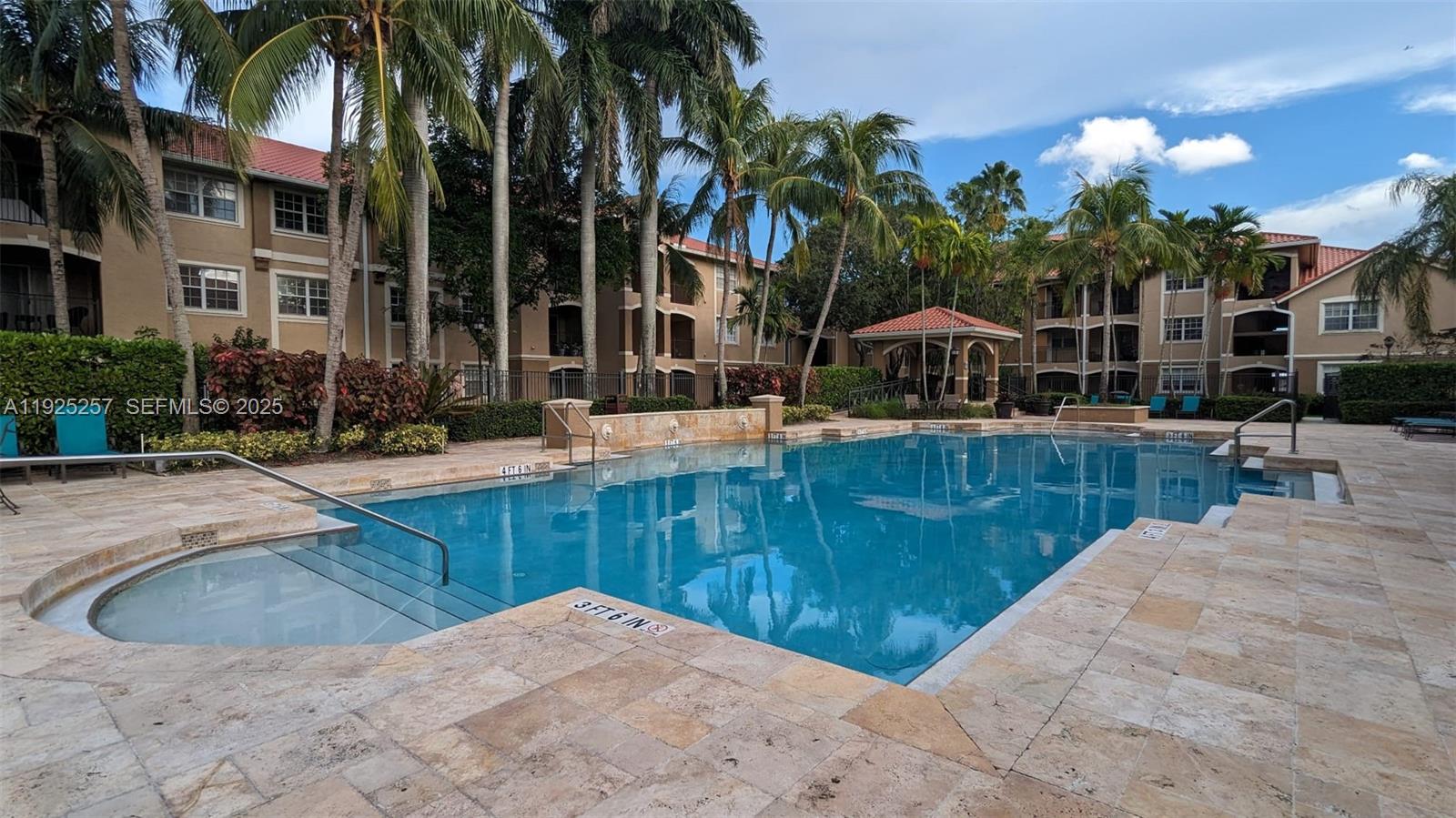 160 Southwest 117th Terrace, Unit 6106 Pembroke Pines, FL 33025 - Photo 23 of 28 a view of a backyard and swimming pool