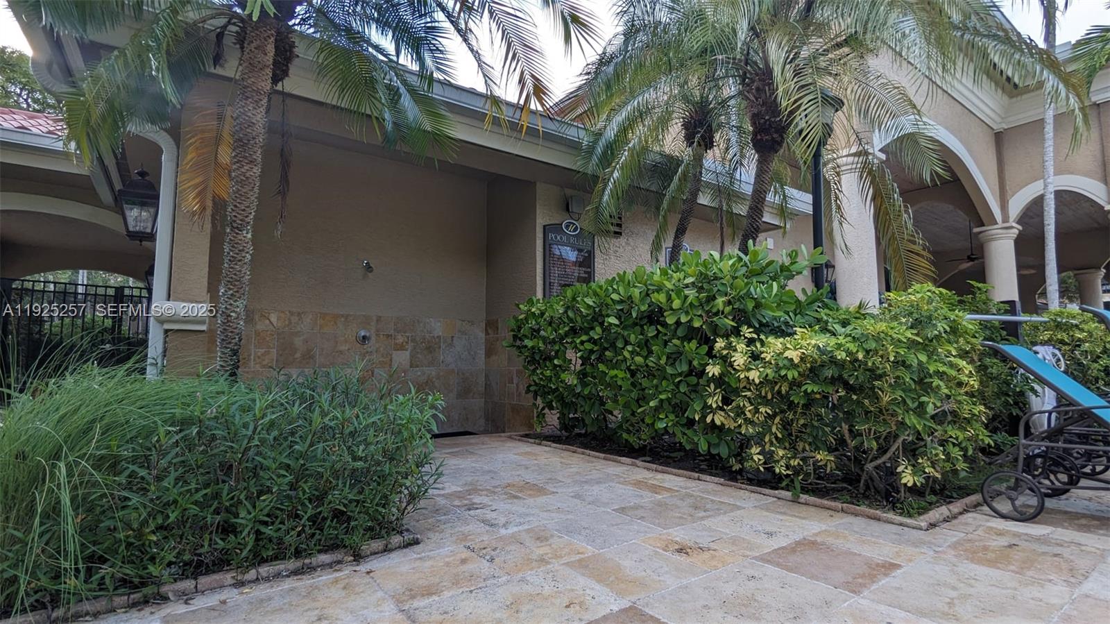 160 Southwest 117th Terrace, Unit 6106 Pembroke Pines, FL 33025 - Photo 27 of 28 a backyard of a house with lots of green space