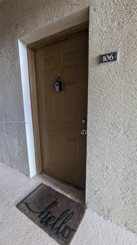 a kitchen with stainless steel appliances a refrigerator and a stove top oven