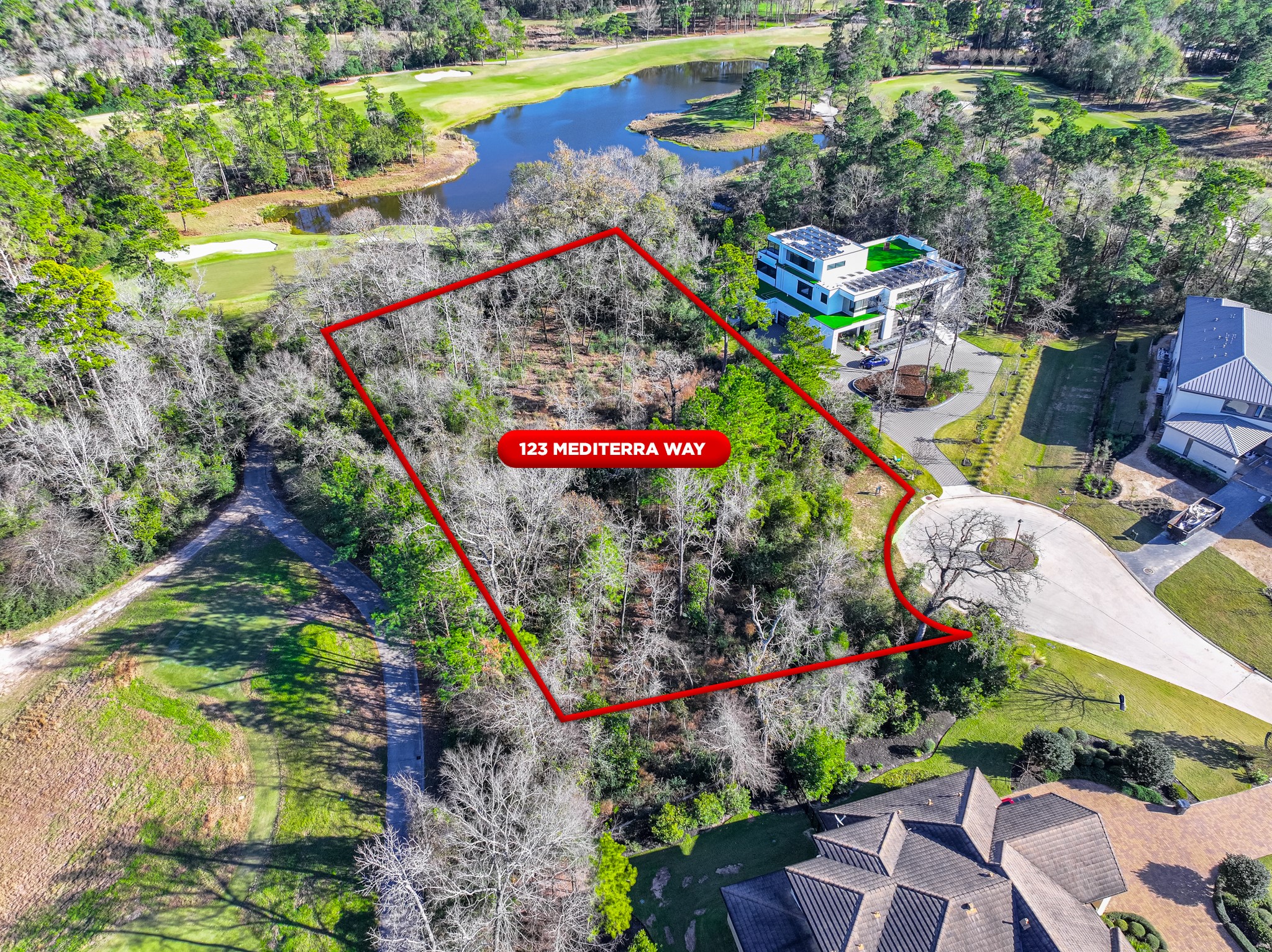 123 Mediterra Way Spring, TX 77389 - Photo 7 of 30 an aerial view of a swimming pool patio and outdoor seating