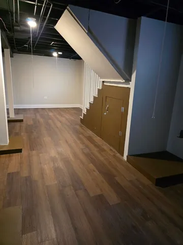 a view of a big room with wooden floor