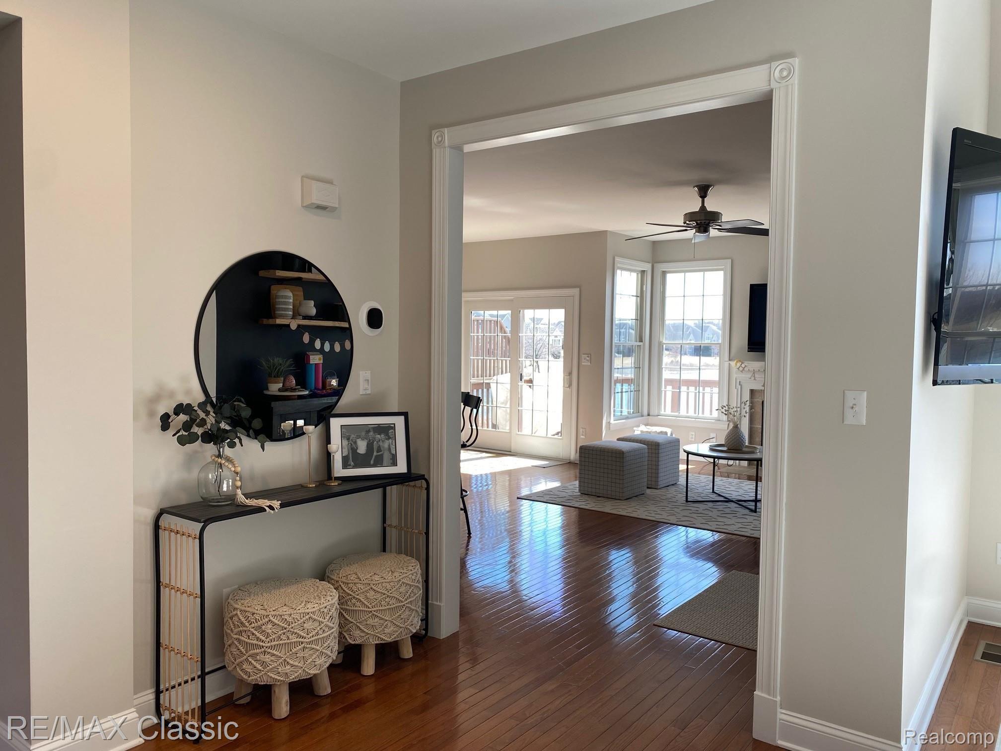 24905 Reeds Pointe Drive, Unit 14 Novi, MI 48374 - Photo 6 of 16 Hallway into Family Room