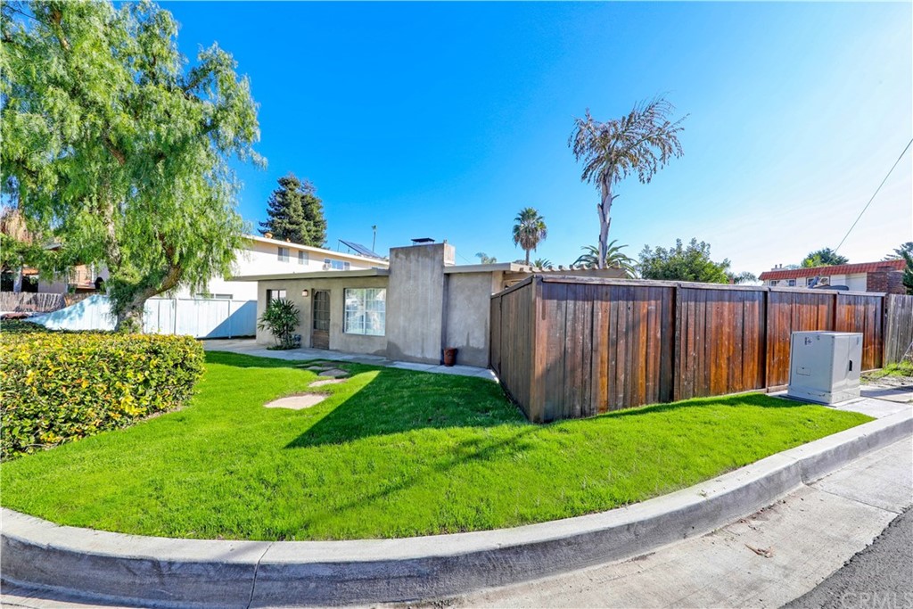 a view of a backyard with a garden