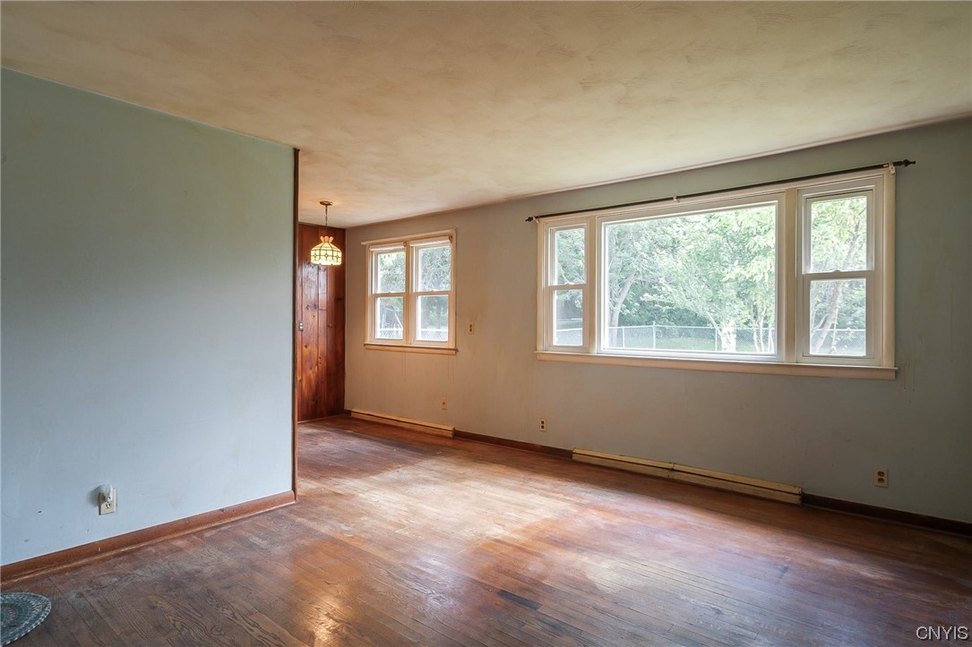 12 Gettman Drive Lysander, NY 13027 - Photo 9 of 29 Living area with adjacent Dining Room