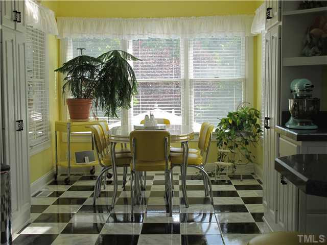 13300 Melvin Arnold Road Raleigh, NC 27613 - Photo 3 of 13 Cheery eating area. Overlooks private yard. Breakfast Area