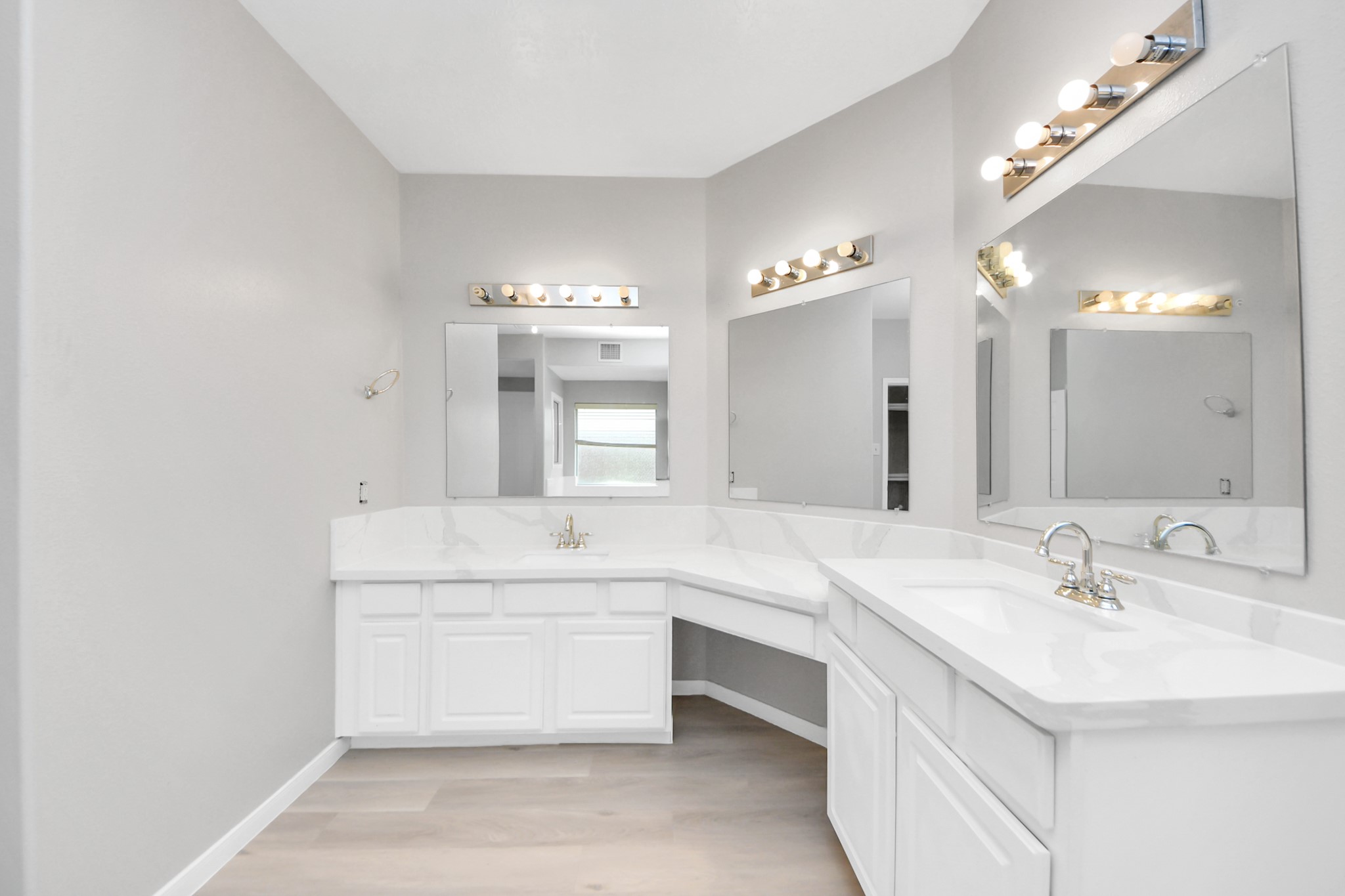 6803 Chapelfield Lane Houston, TX 77049 - Photo 35 of 50 a bathroom with a sink a vanity and a mirror