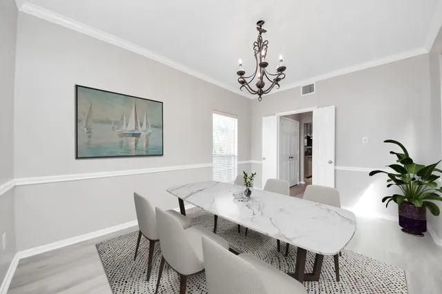 a view of a livingroom with furniture and a window