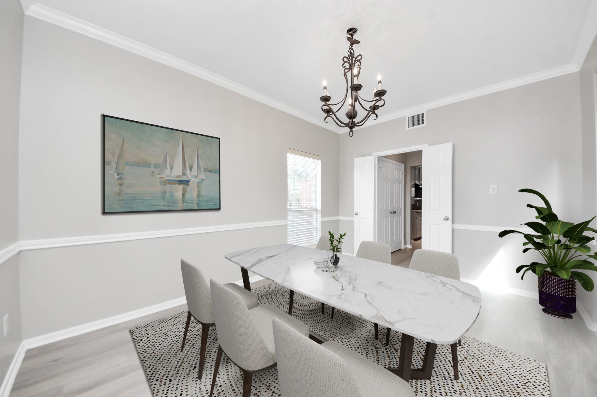 6803 Chapelfield Lane Houston, TX 77049 - Photo 6 of 50 a dining room with furniture potted plants and wooden floor