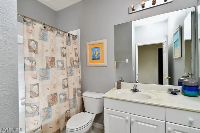 a view of kitchen center island and living room