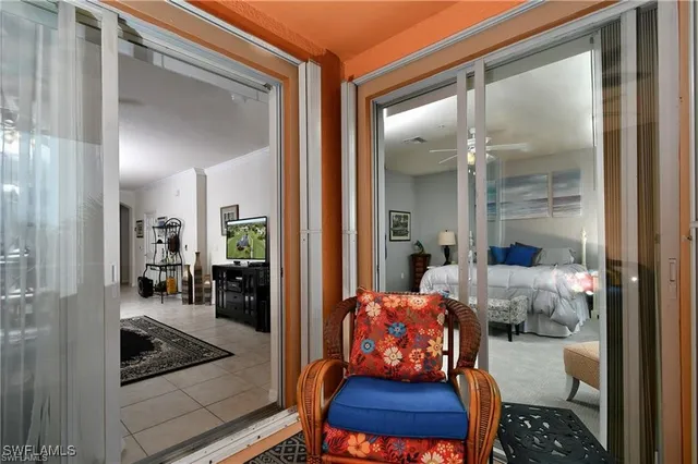 a blue bench sitting in front of a building