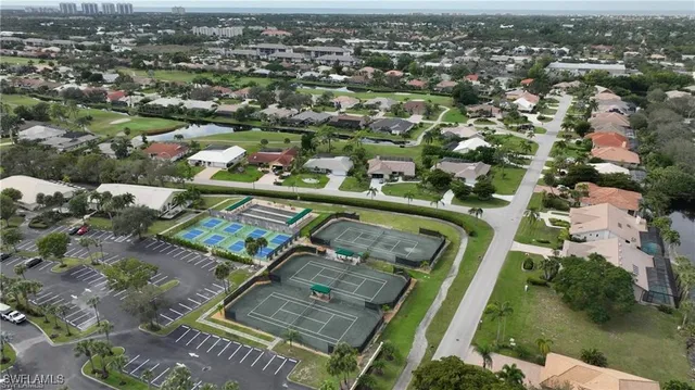 an aerial view of lake residential houses with outdoor space