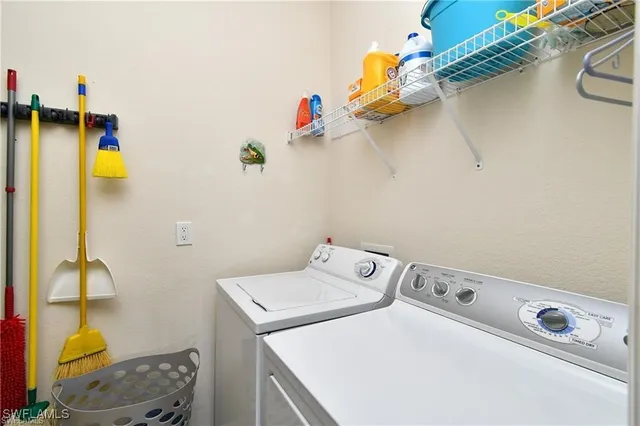 a bedroom with a bed and a night stand