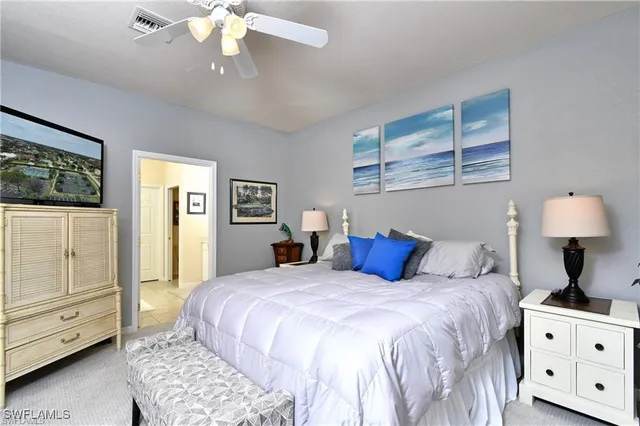 a bathroom with a double vanity sink mirror and