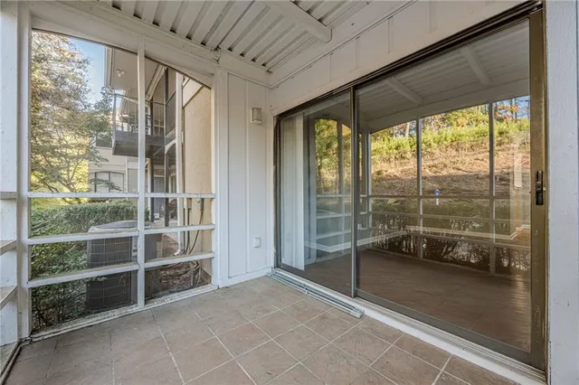 a view of house with swimming pool outdoor seating