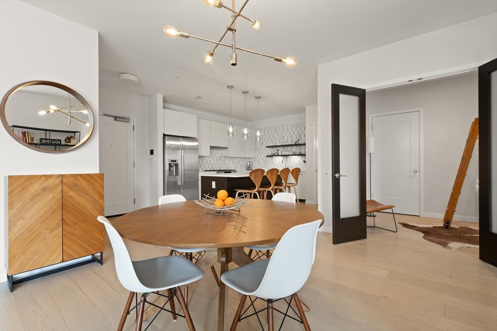 45 West 3rd Street, Unit 512 Boston, MA 02127 - Photo 11 of 40 a view of a dining room with furniture